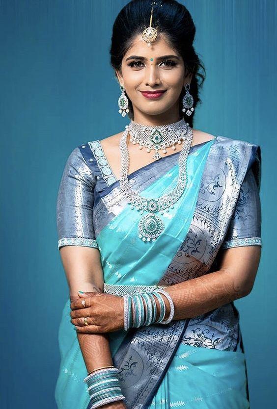 Staring Firozi Soft Banarasi Silk Saree With Unique Blouse Piece - Shop authentic Indian Women's Fashion by Silk Folks