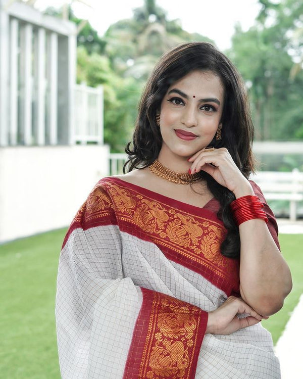 Designer Off White Soft Banarasi Silk Saree With Majesty Blouse Piece