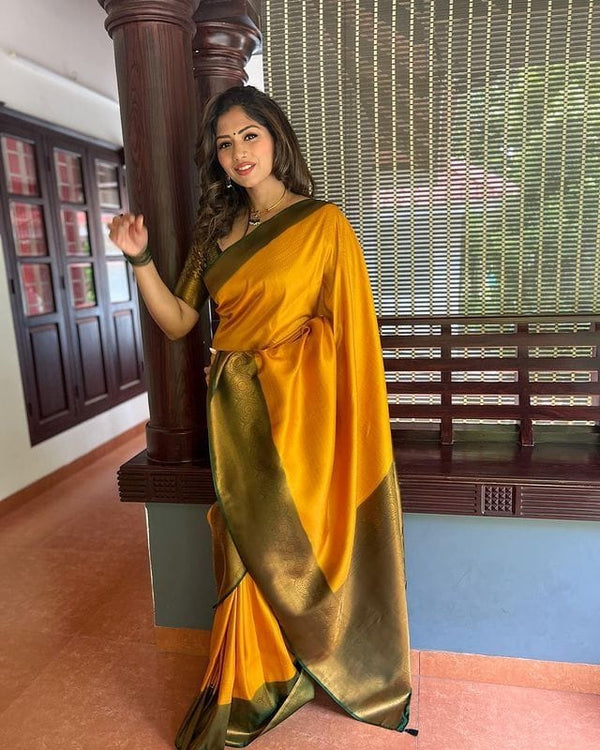 Dazzling Yellow Soft Silk Saree With Beautiful Blouse Piece
