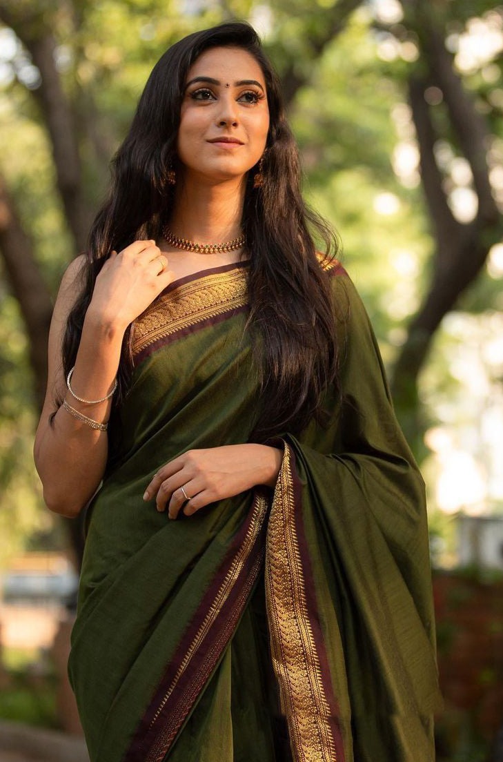 Adorning Green Soft Banarasi Silk Saree With Beauteous Blouse Piece - Shop authentic Indian Women's Fashion by Silk Folks