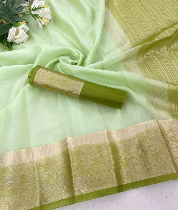 Comely Pista Orgenza Silk Saree With Conflate Blouse Piece