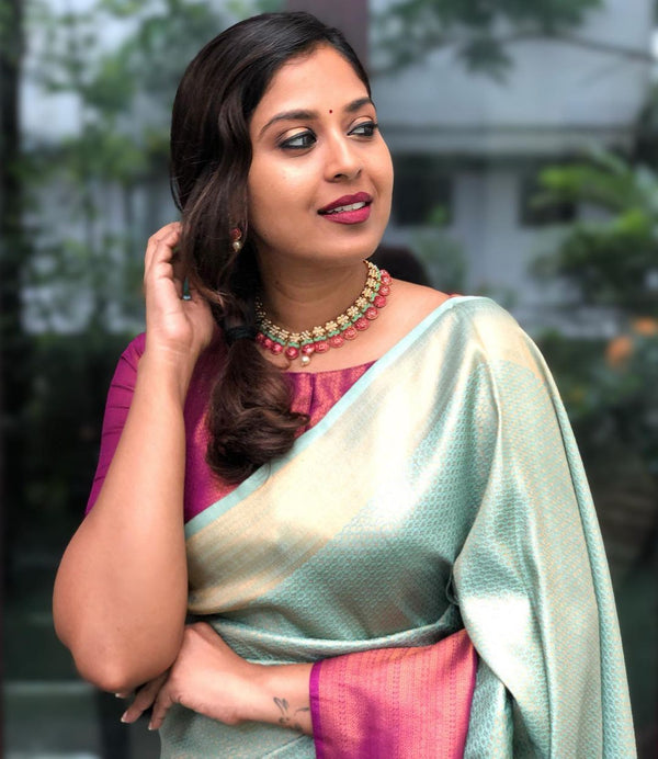 A glam Sea Green Soft Banarasi Silk Saree With Adoring Blouse Piece - Shop authentic Indian Women's Fashion by Silk Folks